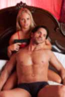 weapon, gun, Sexy sensual heterosexual couple, man, young caucasian woman in love on bed kissing, hugging. Beautiful passionate couple is having sex in a bedroom. Portrait of passion, pleasure, sex, relationship. Copulating